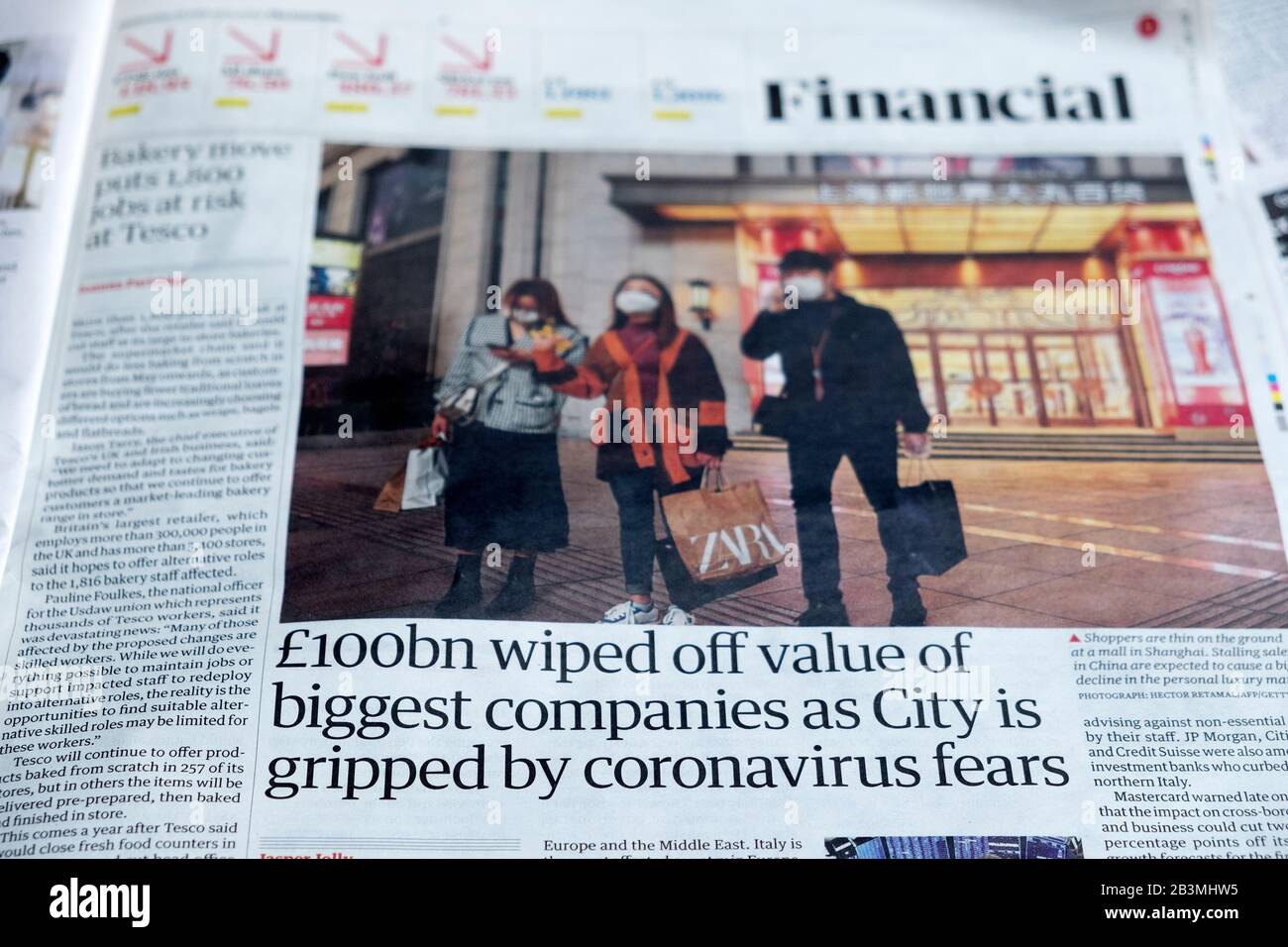 '£100bn ha cancellato il valore delle più grandi aziende come la città è afferrata dal giornale Guardian di Coronavirus paure 'sezione finanziaria febbraio 2020 Foto Stock