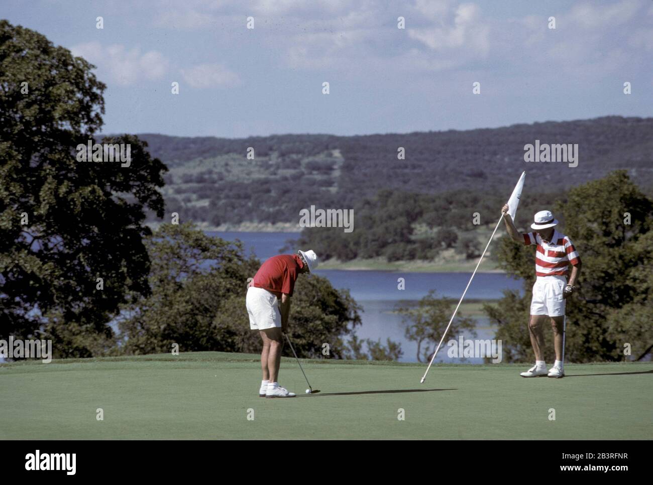 Austin, Texas Stati Uniti d'America: Golfisti ricreativi che giocano un tondo all'Hidden Hills Golf Club. ©Bob Daemmrich Foto Stock