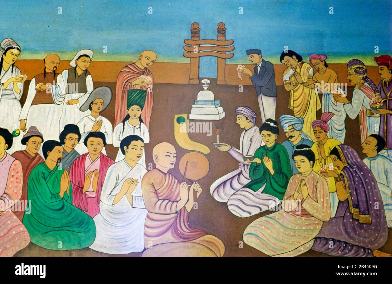 Persone che pregano, Buddha muro pittura, India, Asia Foto Stock