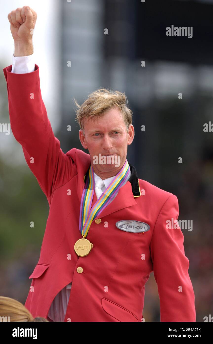Jos Lansink (bel) equitazione , World Equestrian Games, Aachen, 3 settembre 2006, Final Four - scambio di cavalli medaglia d'oro presentazione medaglia Foto Stock