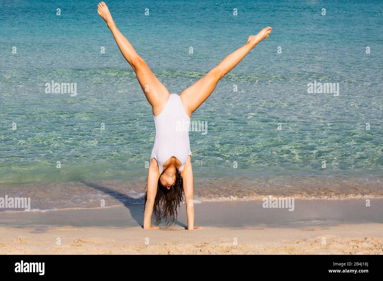 Bicicletta, spiaggia, adolescenti, ginnastica Foto Stock