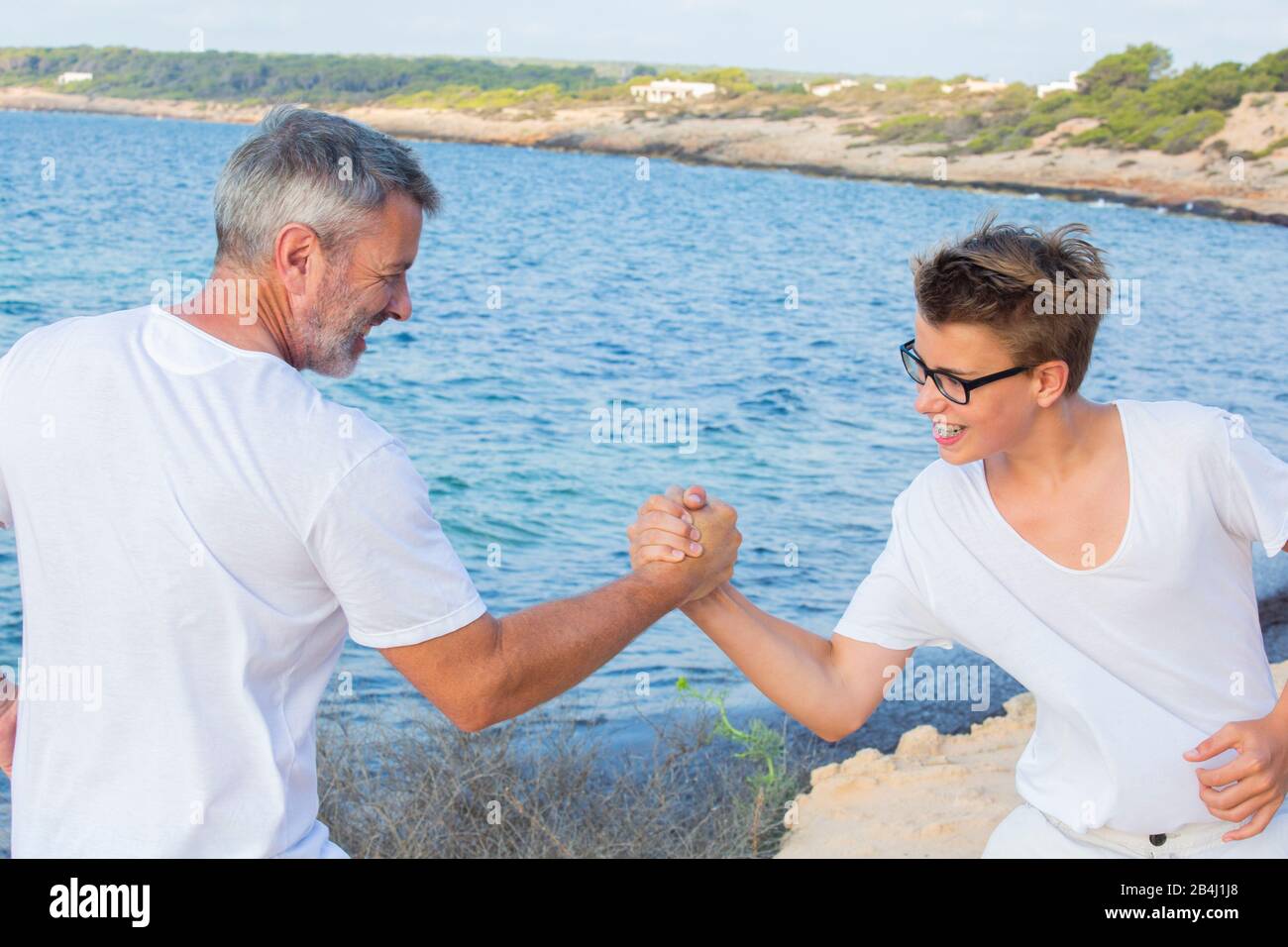 Lotta, padre, figlio, forza Foto Stock