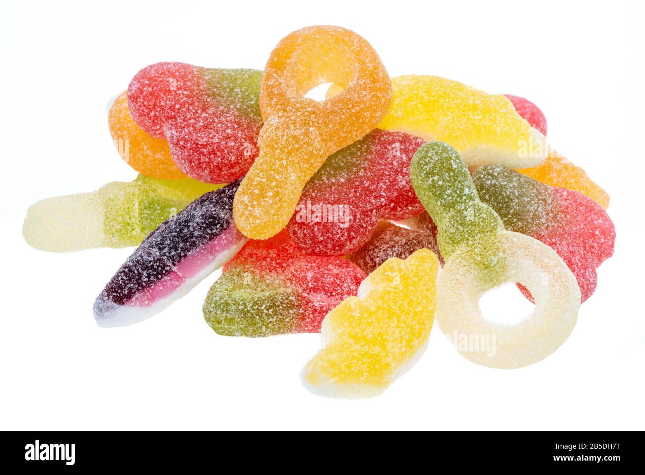 Pila di caramelle acide frizzy - sfondo bianco Foto stock - Alamy