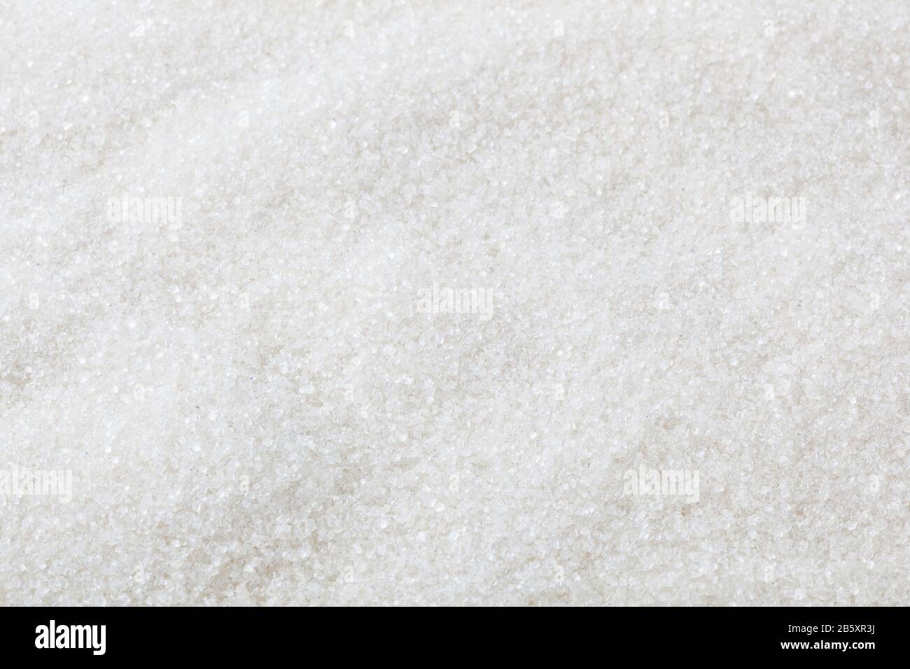 Fondo di zucchero bianco granulato Foto Stock