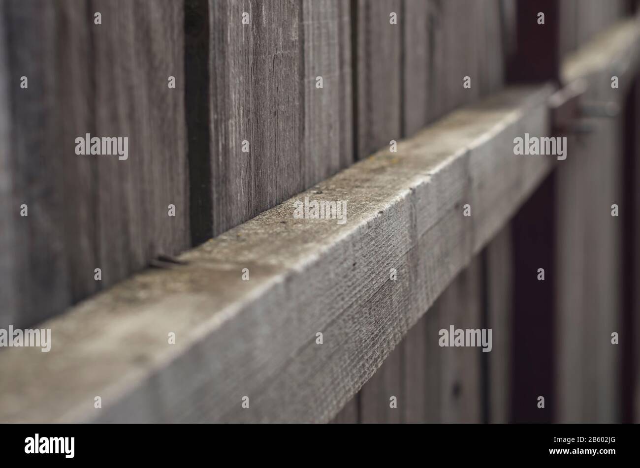 recinto di legno messo a fuoco nel midle. tessitura di legno di recinto rustico Foto Stock