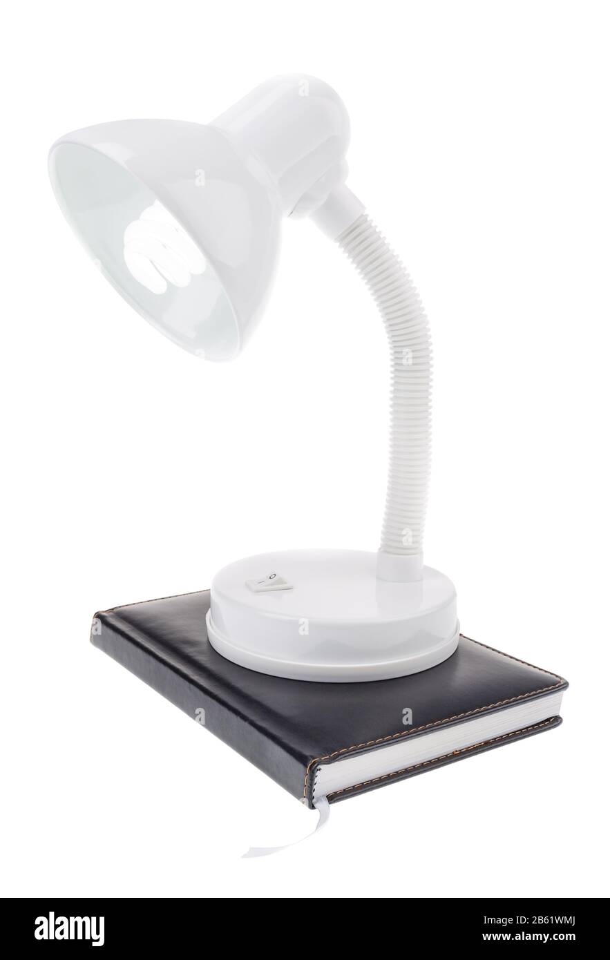 Paralume della lampada notturna sul notebook dell'agenda. Su sfondo bianco. Foto Stock