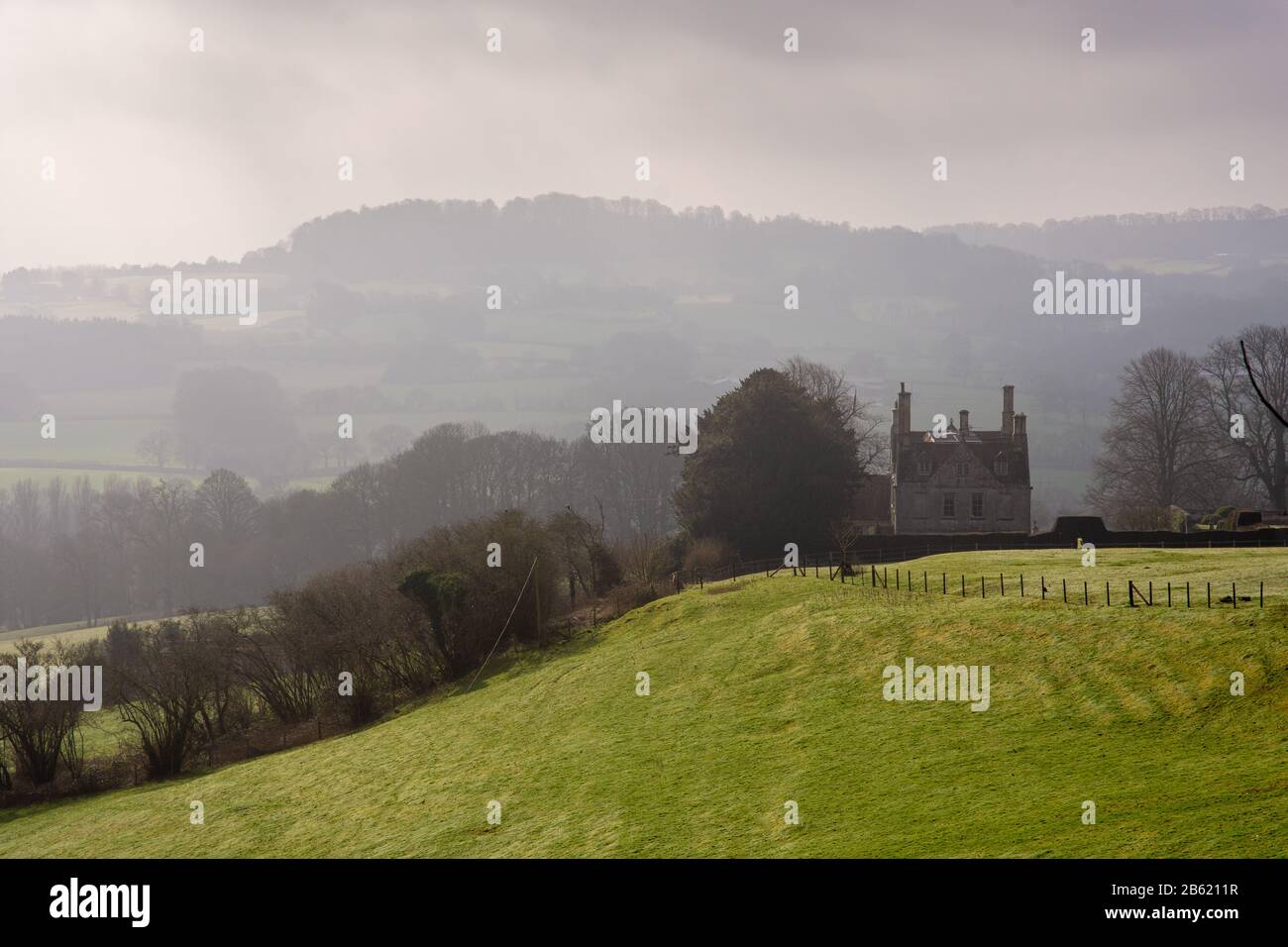 TISBURY, Inghilterra, Regno Unito - 18 febbraio 2017: Il palazzo di Hatch House si trova in un parco nel paesaggio ondulato della vale of Wardour nel West Wiltshire. Foto Stock