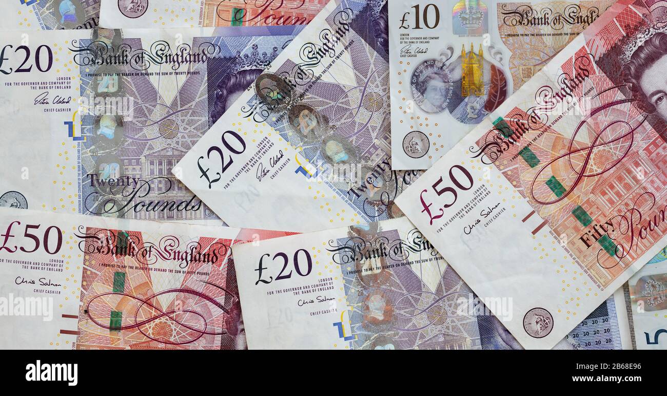 Banconote britanniche di fondo Foto Stock
