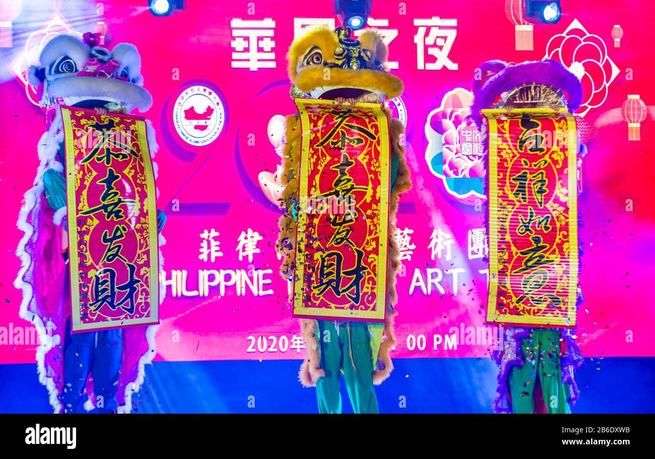 Spettacolo di danza del Leone a Chinatown Manila, Filippine Foto Stock