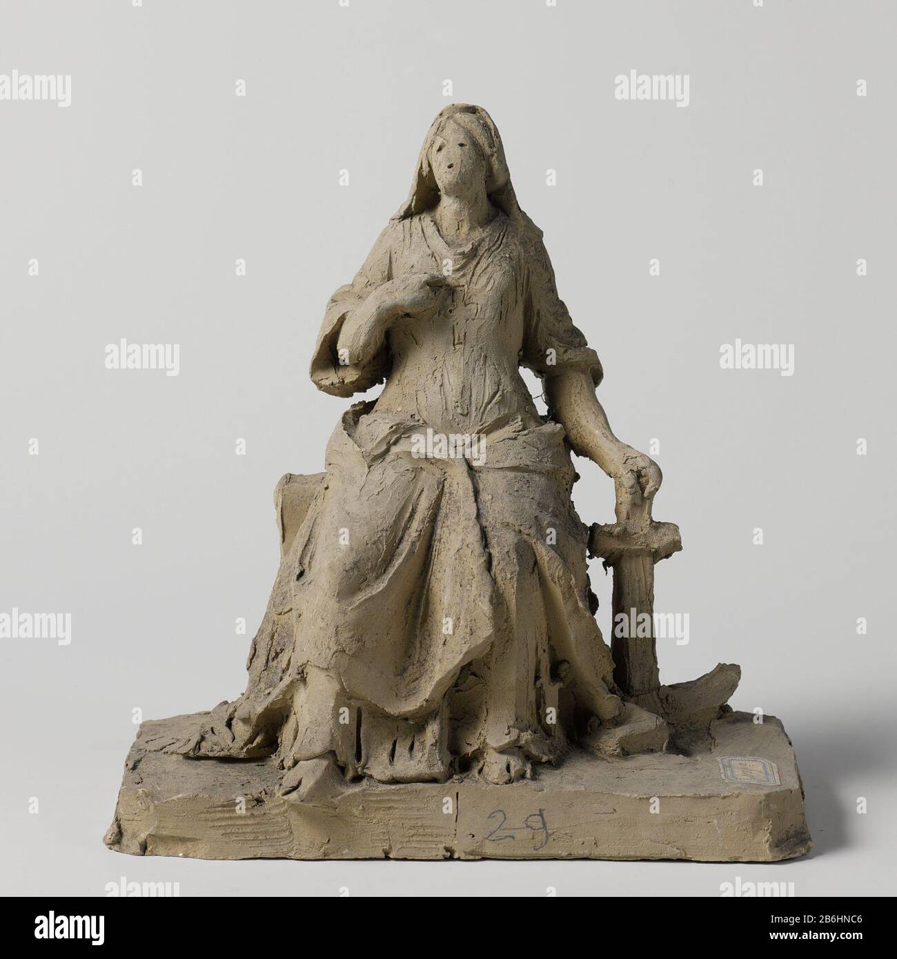 Hope De Hoop Object Type : beeldhouwwerk Objectnummer: BK-18800 Produttore : beeldhoumwer: Eugène Lacomblé Appuntamenti: 1800 - 1950 Materiale: Klei dimensioni: H 21 cm. × b 20 cm. × d 8,7 cm. Foto Stock