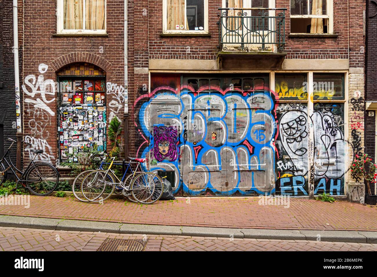Biciclette e graffiti, Amsterdam Foto Stock
