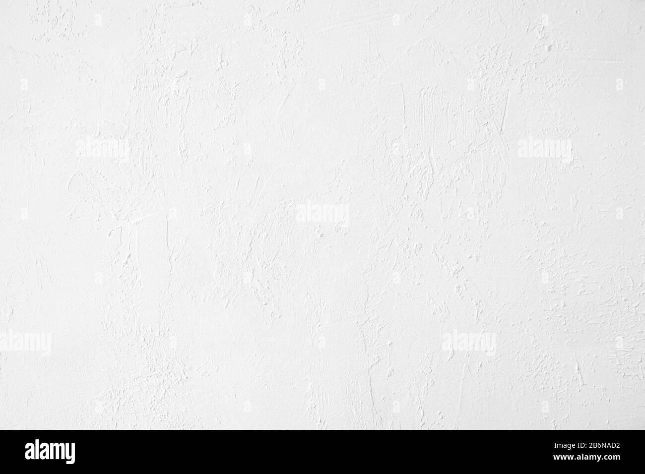 Sfondo bianco a basso contrasto In Cemento testurizzato con rugosità e irregolarità Foto Stock