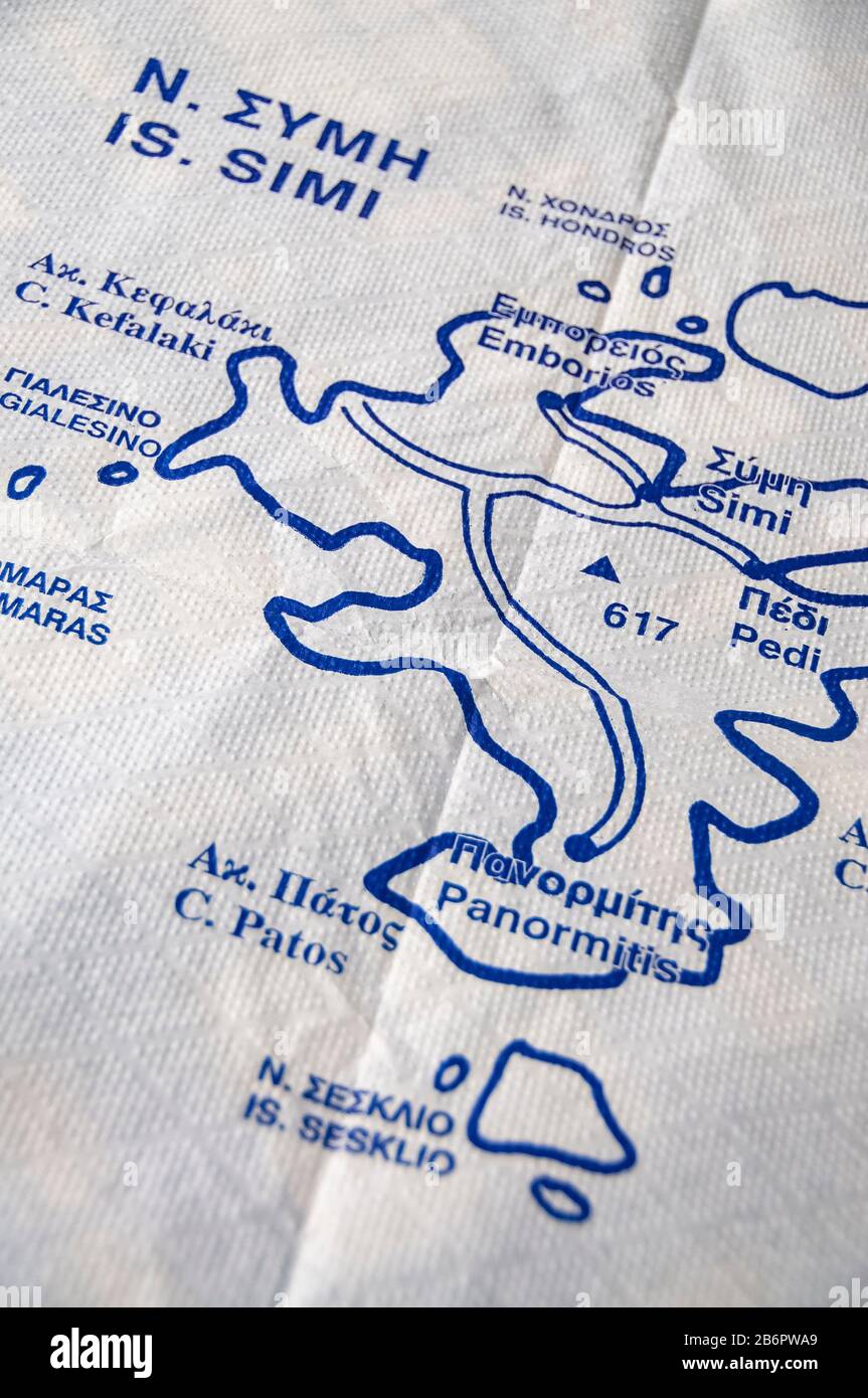 Tovaglia di carta con la mappa dell'isola di Symi Città di Symi Isole Greche Grecia Foto Stock