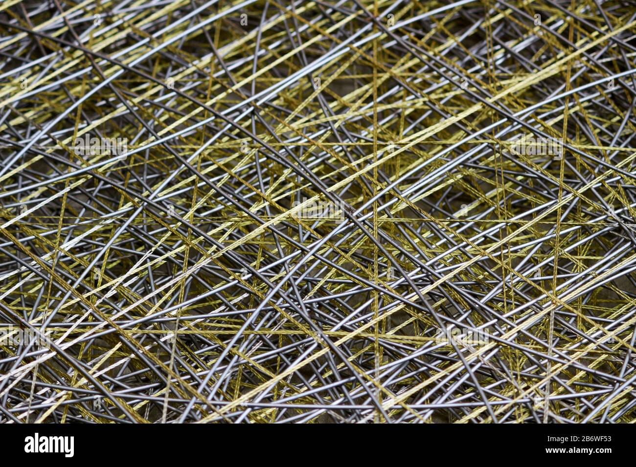 Materiale astratto di fondo assemblato con fili e fili sottili Foto Stock