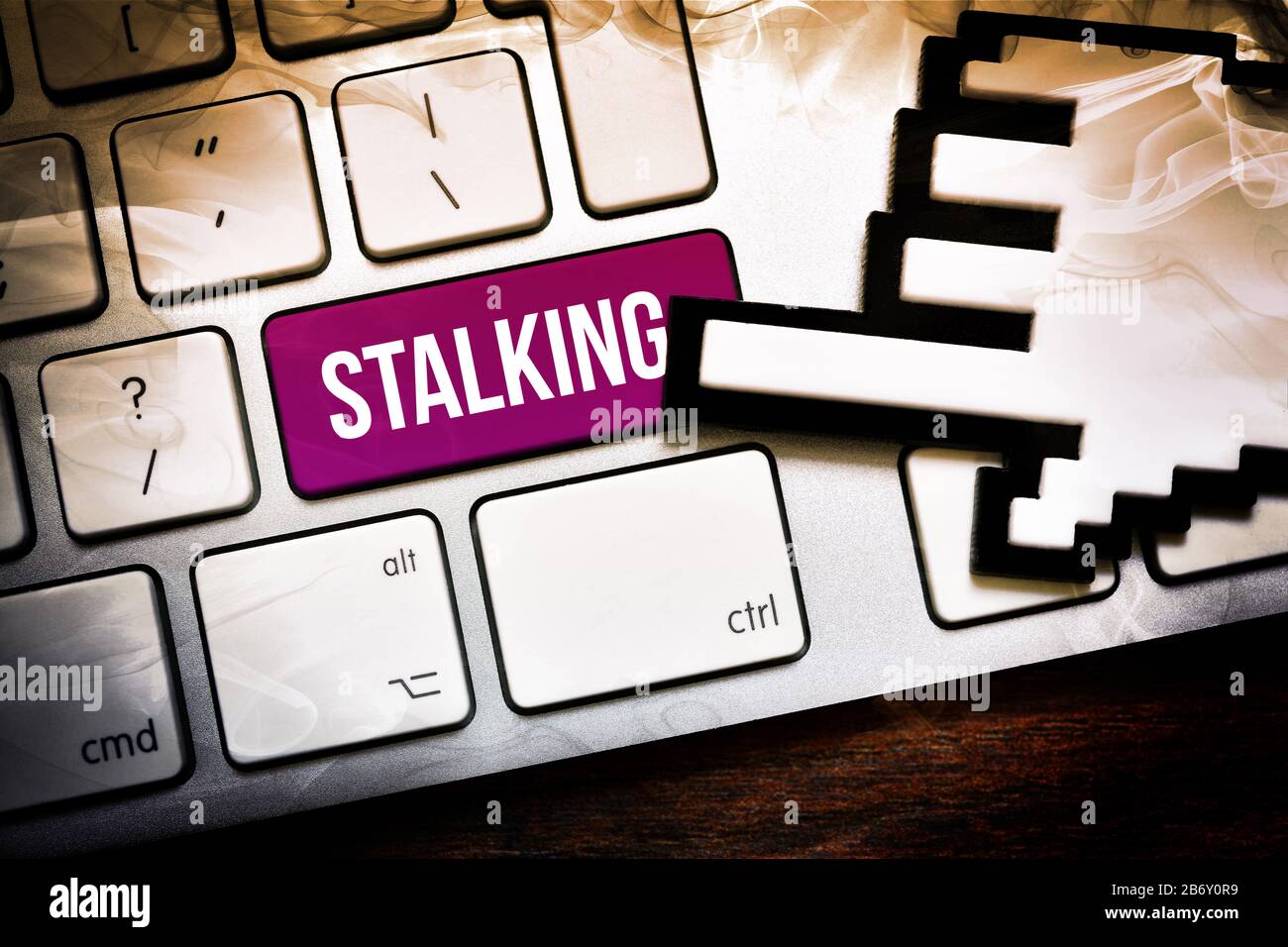 FOTOMONTAGE, Computertaste mit der Aufschrift Stalking Foto Stock