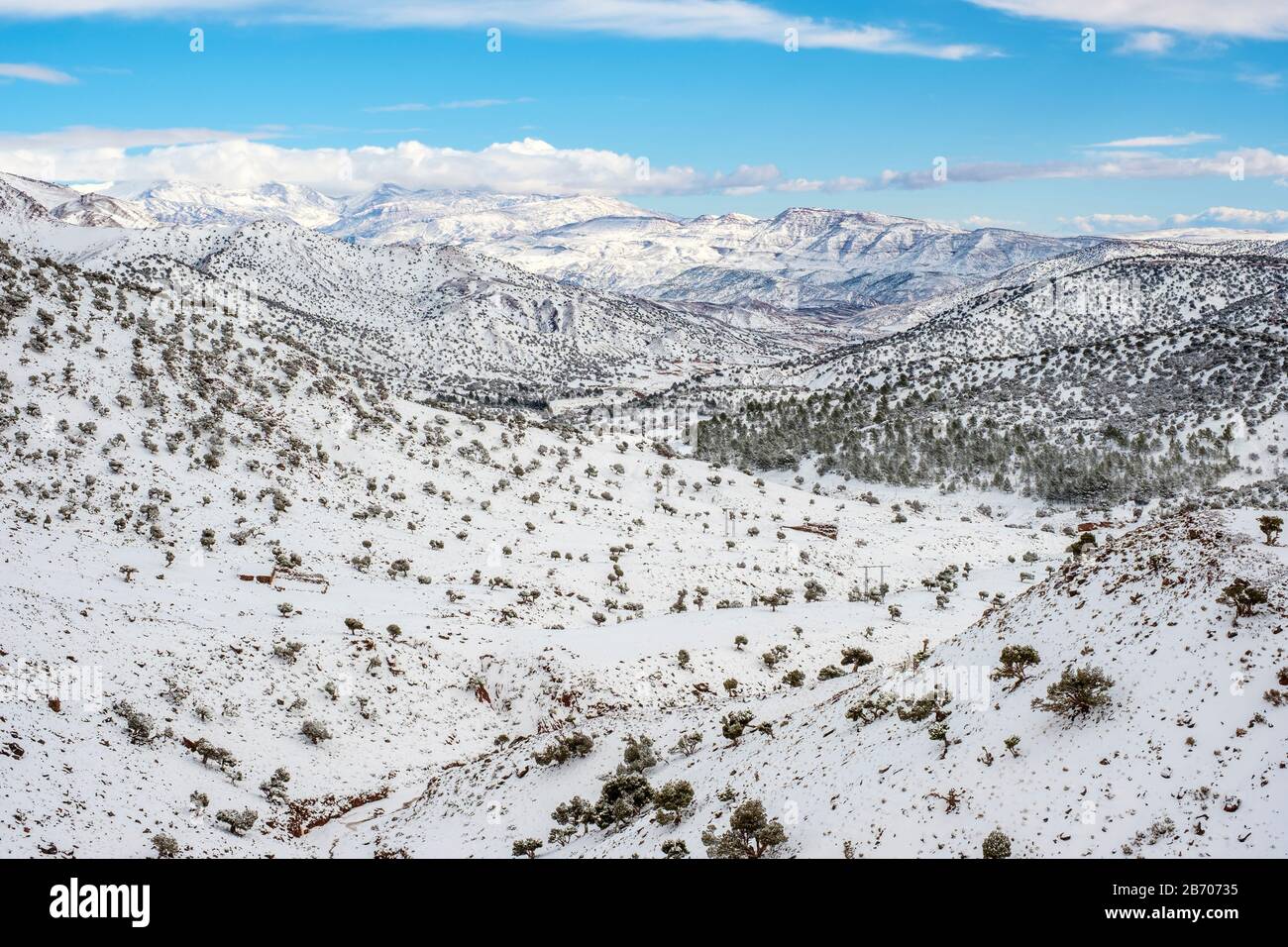 Il Marocco, SoussMassa (Sous-Massa-Draa), provincia di Ouarzazate. Atlas Montagne Paesaggio durante l'inverno la neve. Foto Stock
