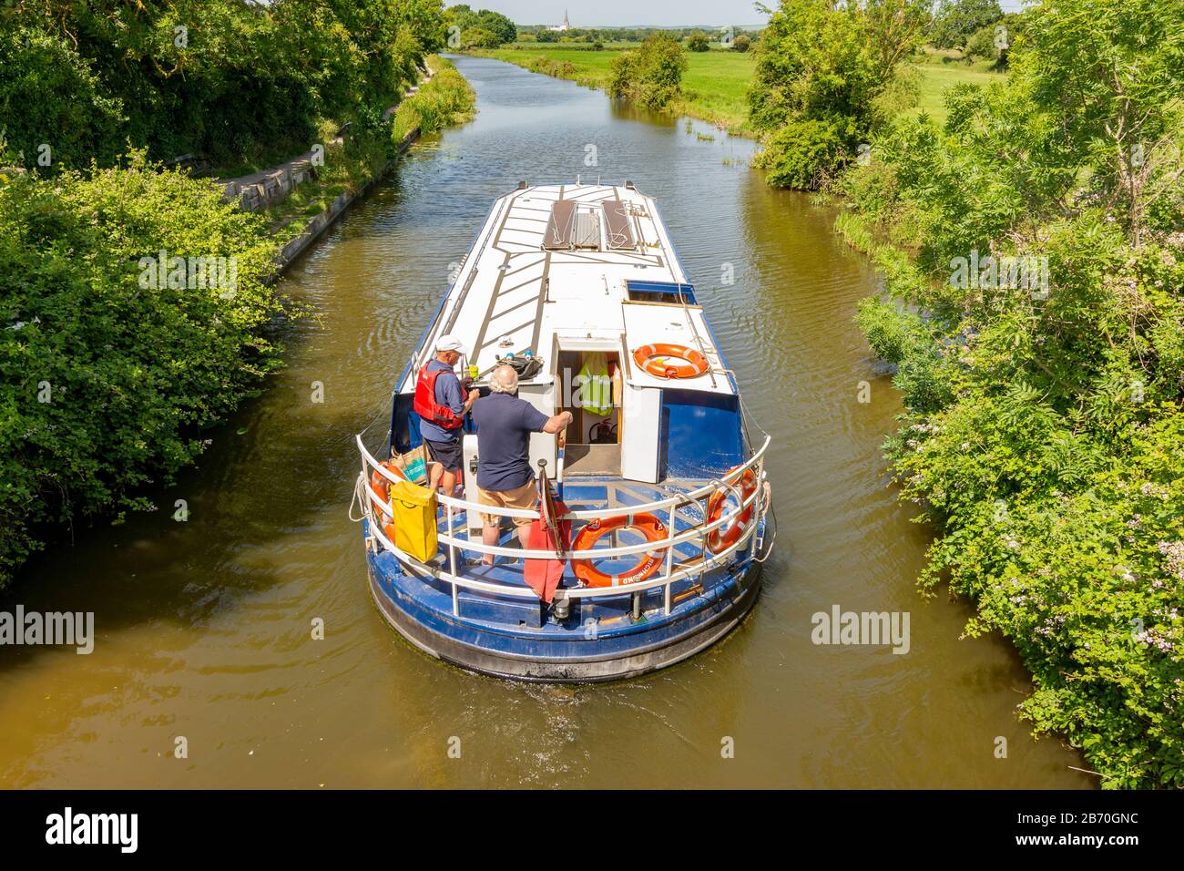 La barca Kingfisher Pleasure sul Chichester Ship Canal, West Sussex, Inghilterra, Regno Unito. Foto Stock