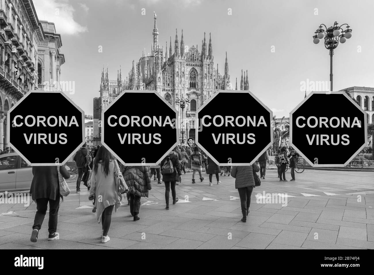 Corona Virus sul cartello rosso di fronte al Duomo di Milano in Italia Foto Stock