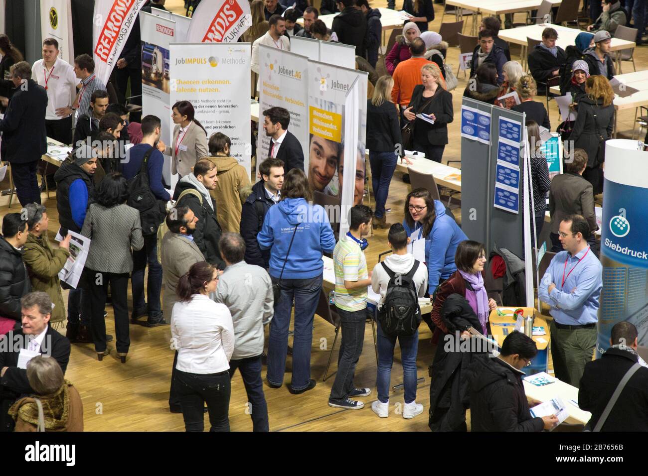 Scambio di lavoro per i rifugiati a Berlino, 29.02.2016. Più di 3,500 rifugiati in cerca di lavoro si sono registrati per informare 210 datori di lavoro che esibiscono e iniziative educative sulla descrizione del lavoro e sulla formazione. [traduzione automatica] Foto Stock