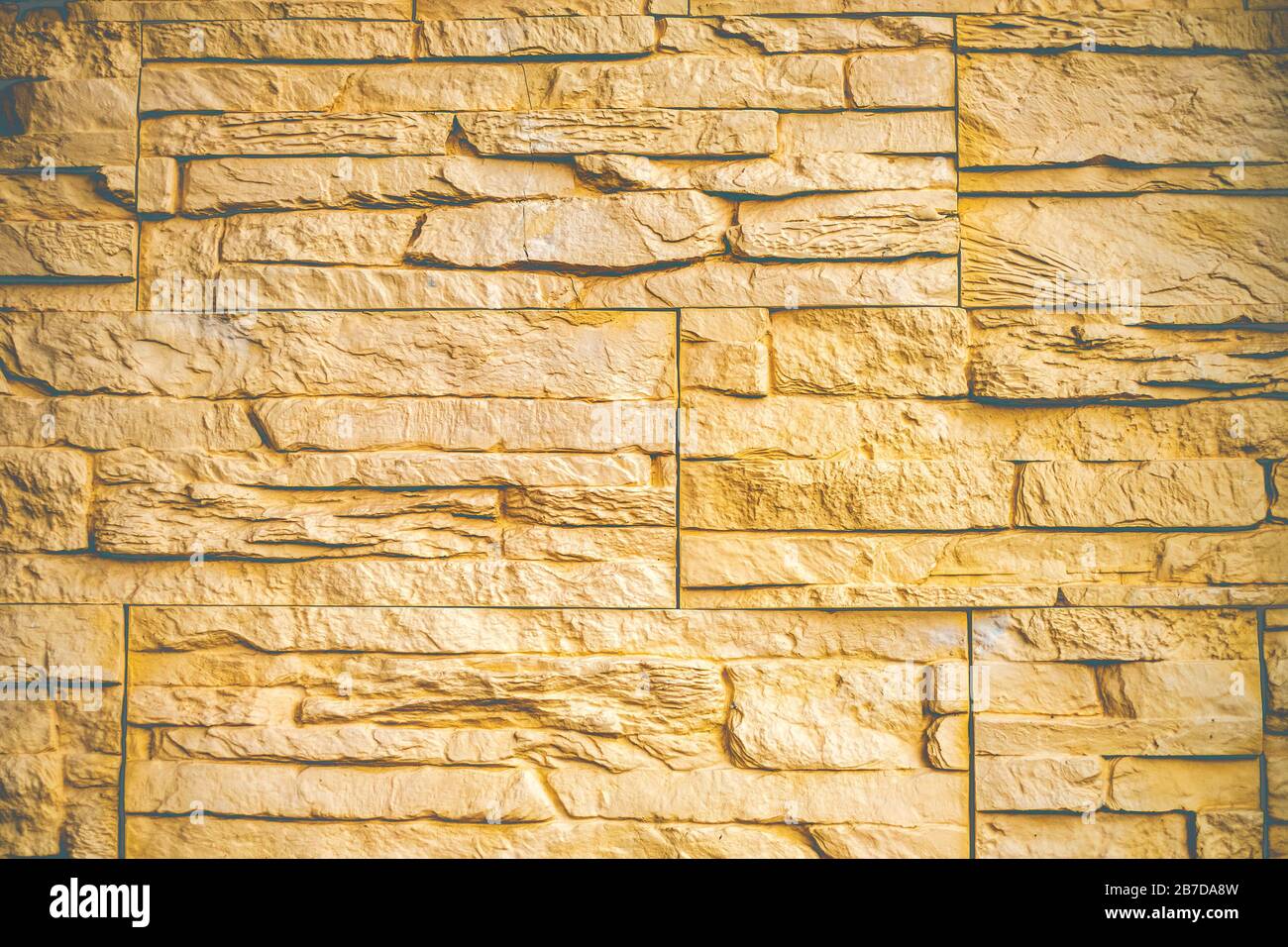 sfondo in mattoni beige con texture Foto Stock