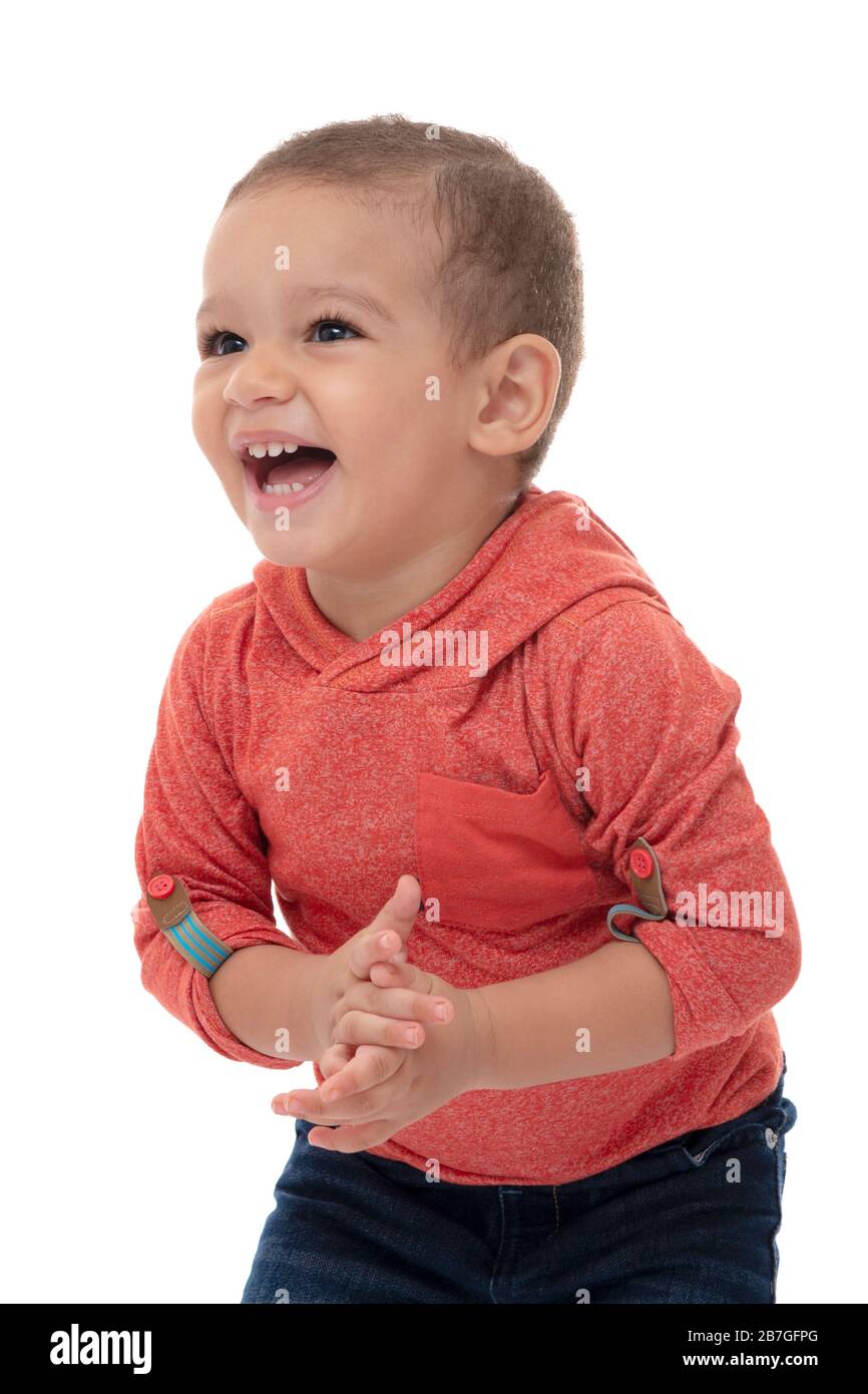 Divertente bella giovane bambino Laughing istericamente, isolato su sfondo bianco Foto Stock