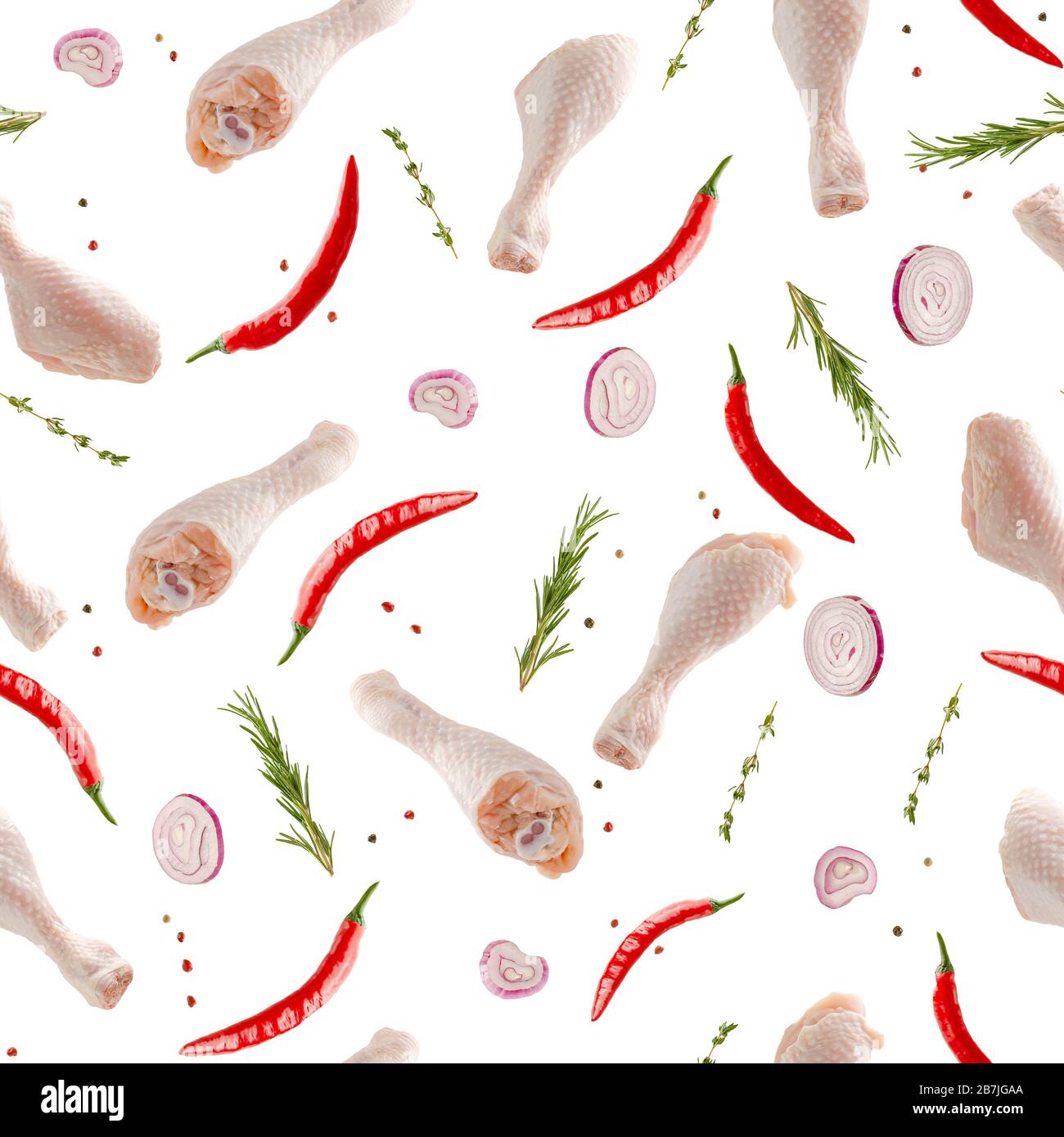 Bastoncini di pollo crudo volanti o gambe con spezie su sfondo bianco. Cibo asiatico piccante. Ripetizione senza giunture Foto Stock