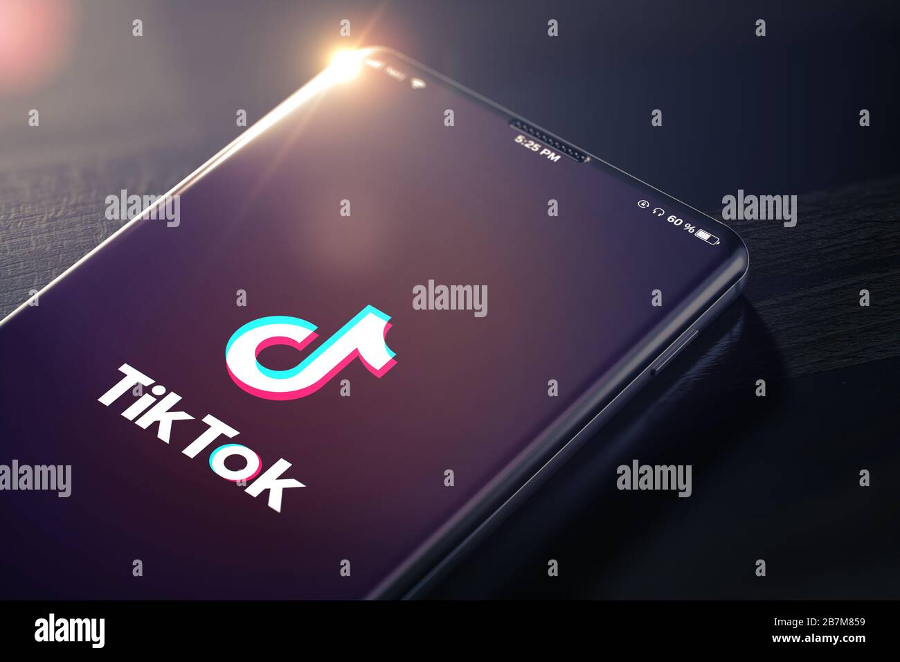 KIEV, UCRAINA-GENNAIO, 2020: Tiktok sullo schermo del telefono cellulare. Tiktok è un servizio cinese di video-sharing social networking utilizzato per creare video comici e talent. Illustrazione 3D. Primo piano. Foto Stock