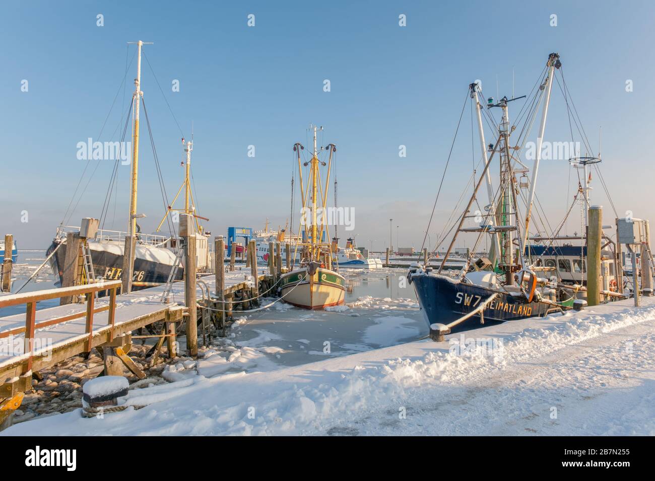 Habour ghiacciato in inverno estremamente freddo, isola di Föhr, Mare del Nord, Patrimonio dell'Umanità dell'UNESCO, Frisia del Nord, Schleswig-Holstein, Germania del Nord, Europa Foto Stock