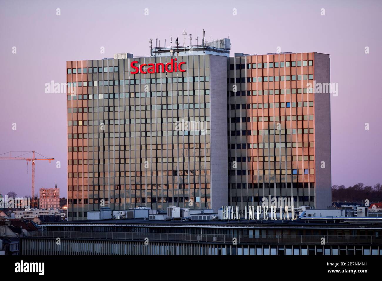 Copenhagen, la capitale della Danimarca, Scandic hotel al sole sorgere Foto Stock