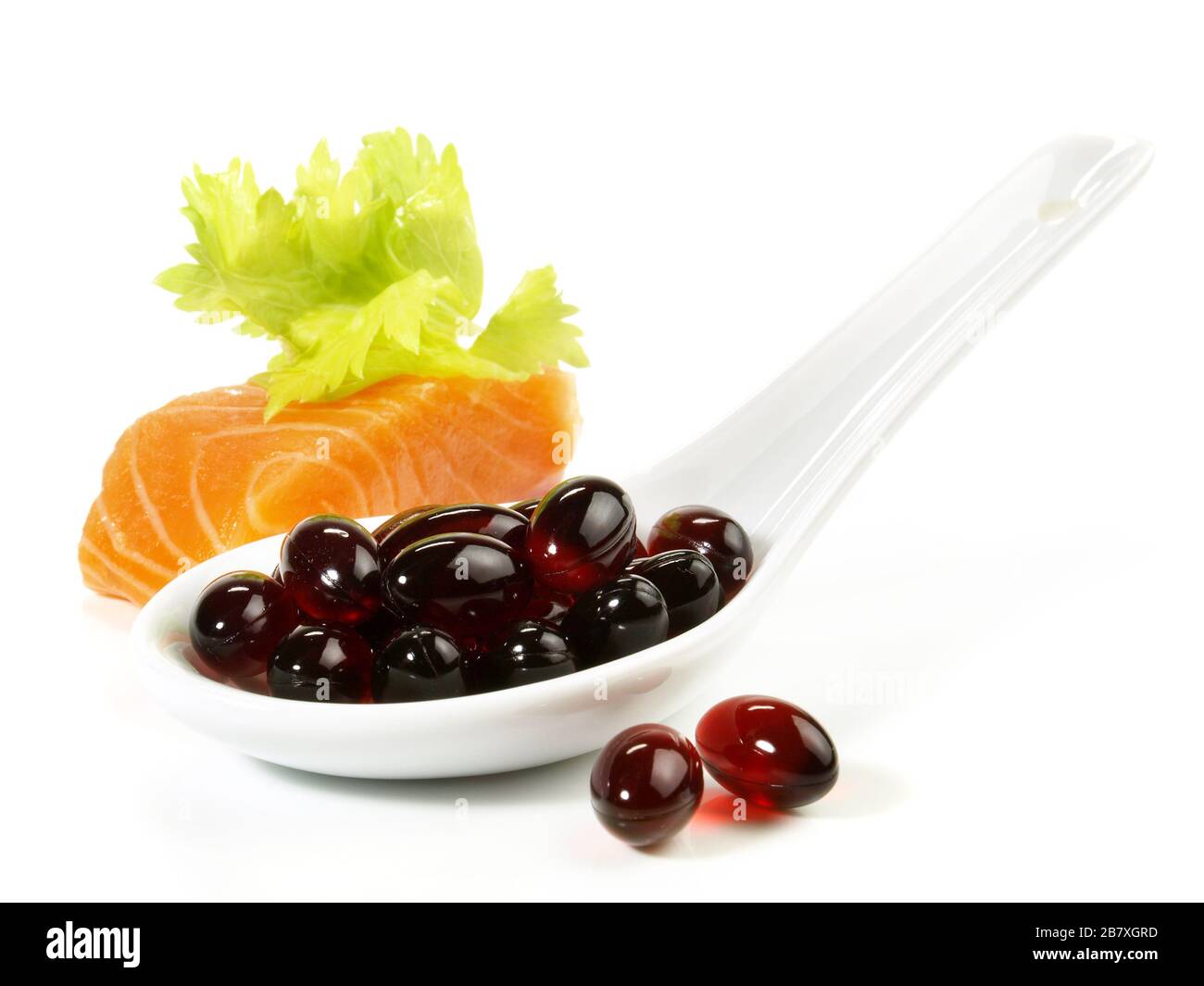 Astaxantina pillole su sfondo bianco Foto Stock