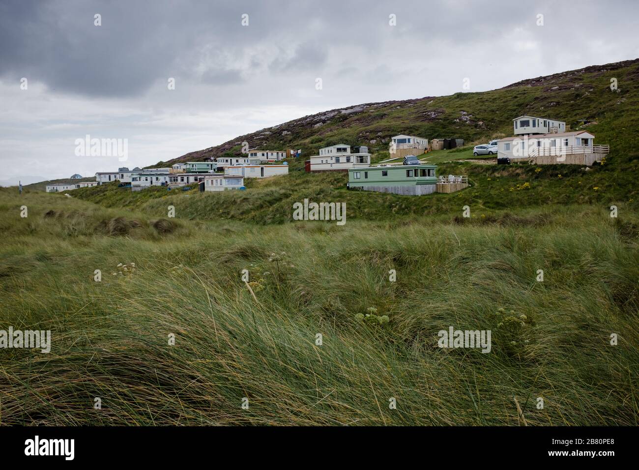 Case mobili in un parco di rimorchi in un campo di pipistrelli Foto Stock