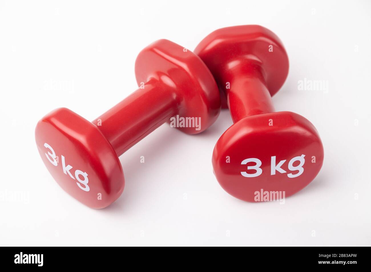 Coppia di 3 kg di Dumbbell Foto Stock