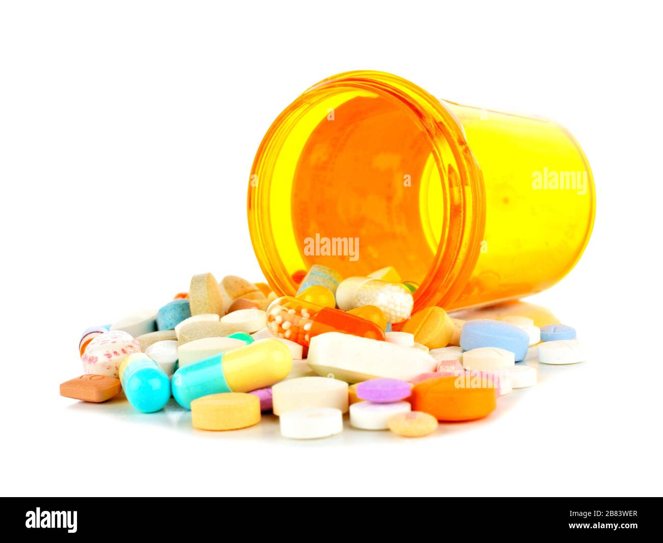 Flacone per pillola con versamento di farmaci su bianco Foto Stock