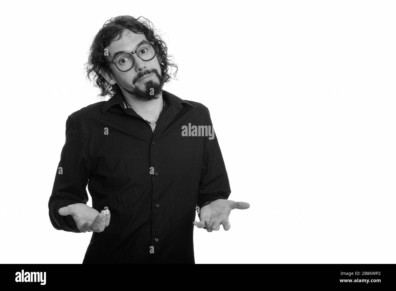 Bell'uomo caucasico che guarda confuso Foto Stock