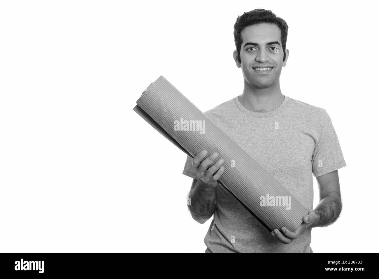 Ritratto di giovane persiano felice pronto per la palestra Foto Stock