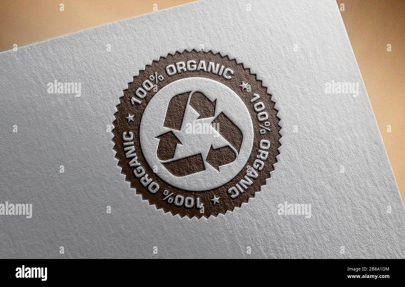 Riciclare il logo su sfondo di carta riciclata. Foto Stock