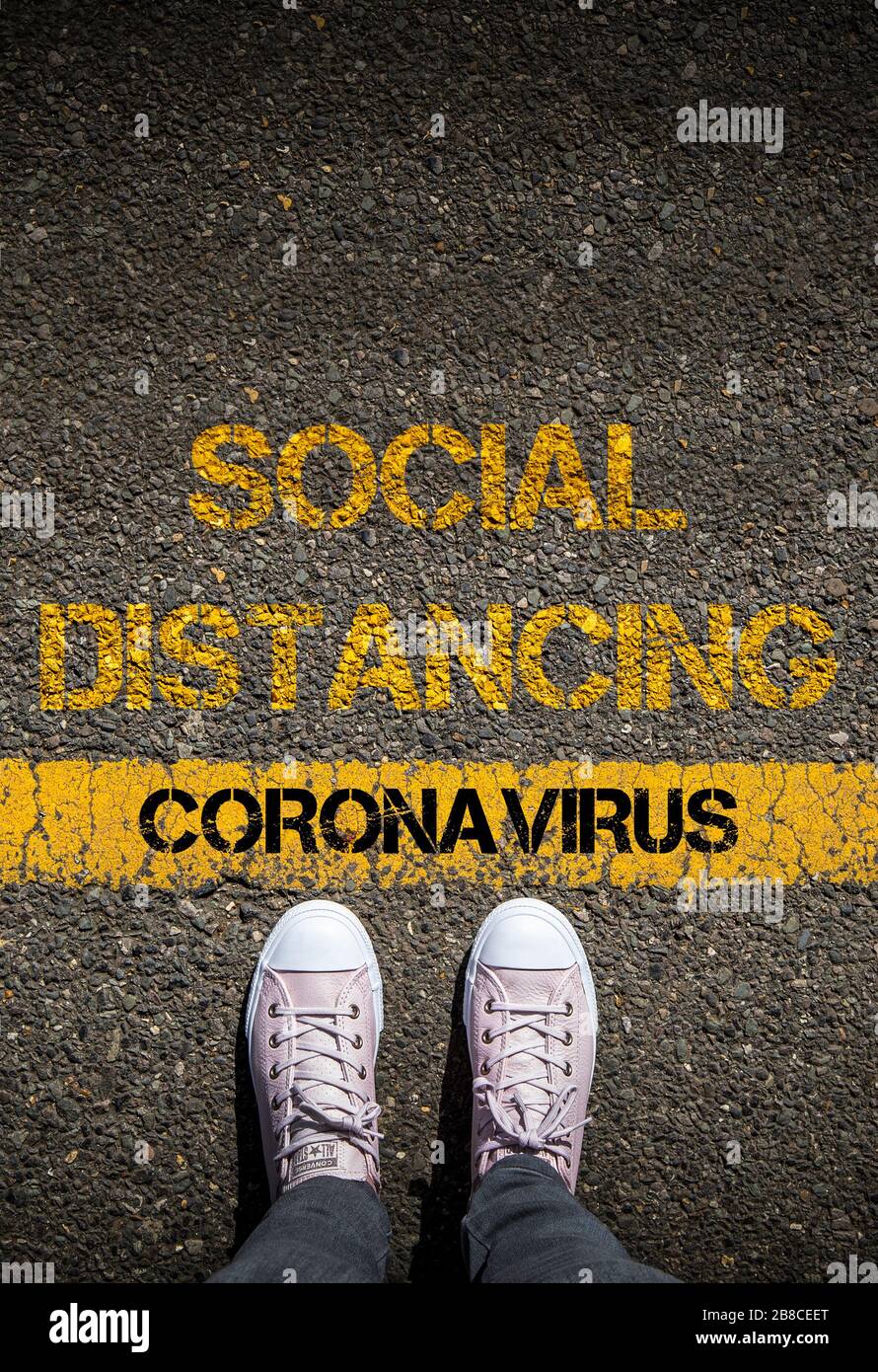Distanza sociale per ridurre la diffusione di Coronavirus, immagine concettuale. Foto Stock
