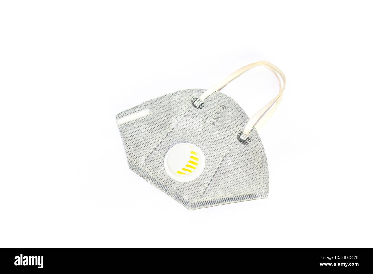 Una maschera antipolvere semimaschera è generalmente indossata per proteggere l'utilizzatore da piccole particelle Foto Stock
