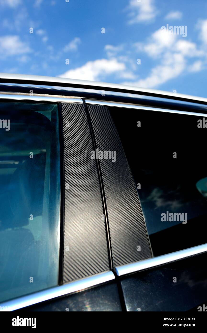 auto, auto, dettagli, lucidatura, protezione, cera umida, carrozzeria auto, nero, lavoro, cura, shampoo, cera, acqua, lucidatura, vernice, protezione vernice, dettagli Foto Stock