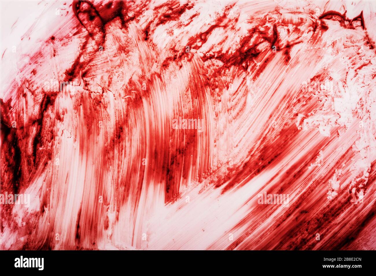 Segni di sangue rosso su sfondo bianco Foto Stock