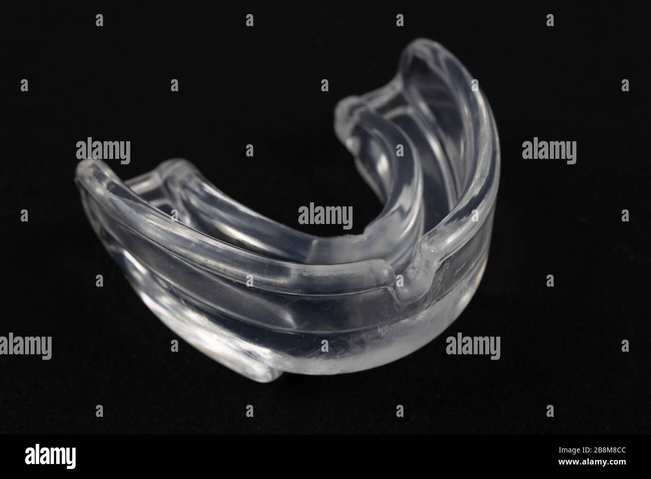 Dispositivo di protezione per la bocca per prevenire e ridurre le lesioni. Fotografia di prodotti sportivi Foto Stock