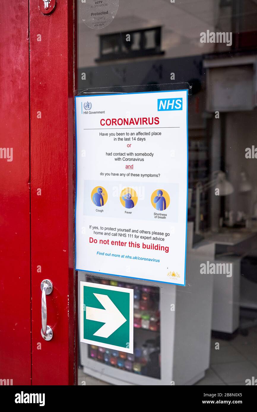 Covid-19 poster di informazioni sul Coronavirus pubblicato da Public Health England Foto Stock