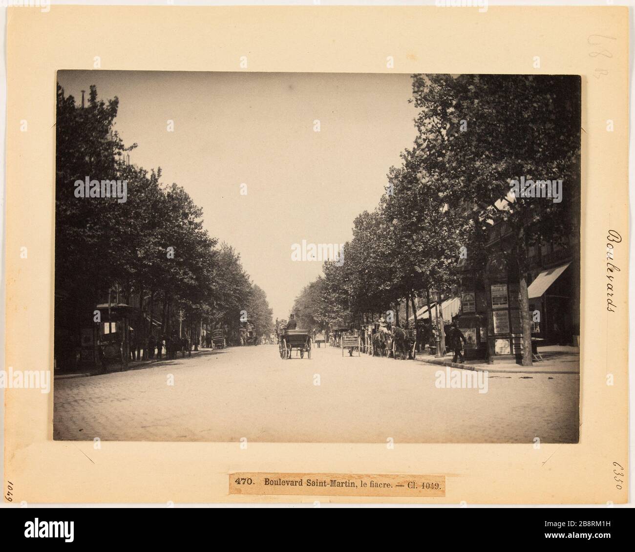 Boulevards / 470 Boulevard Saint-Martin, il pullman. Cl. 1049 Fiacre sul Boulevard Saint-Martin, 10 ° arrondissement, Parigi 'Fiacre sur le boulevard Saint-Martin, Parigi (Xème arr.)'. Photographie d'Hippolyte Blancard (1843-1924), vers 1890. Parigi, musée Carnavalet. Foto Stock