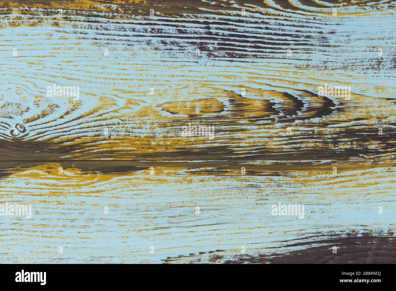 plance di legno texture con vernice di colore incrinato per sfondo. Foto Stock