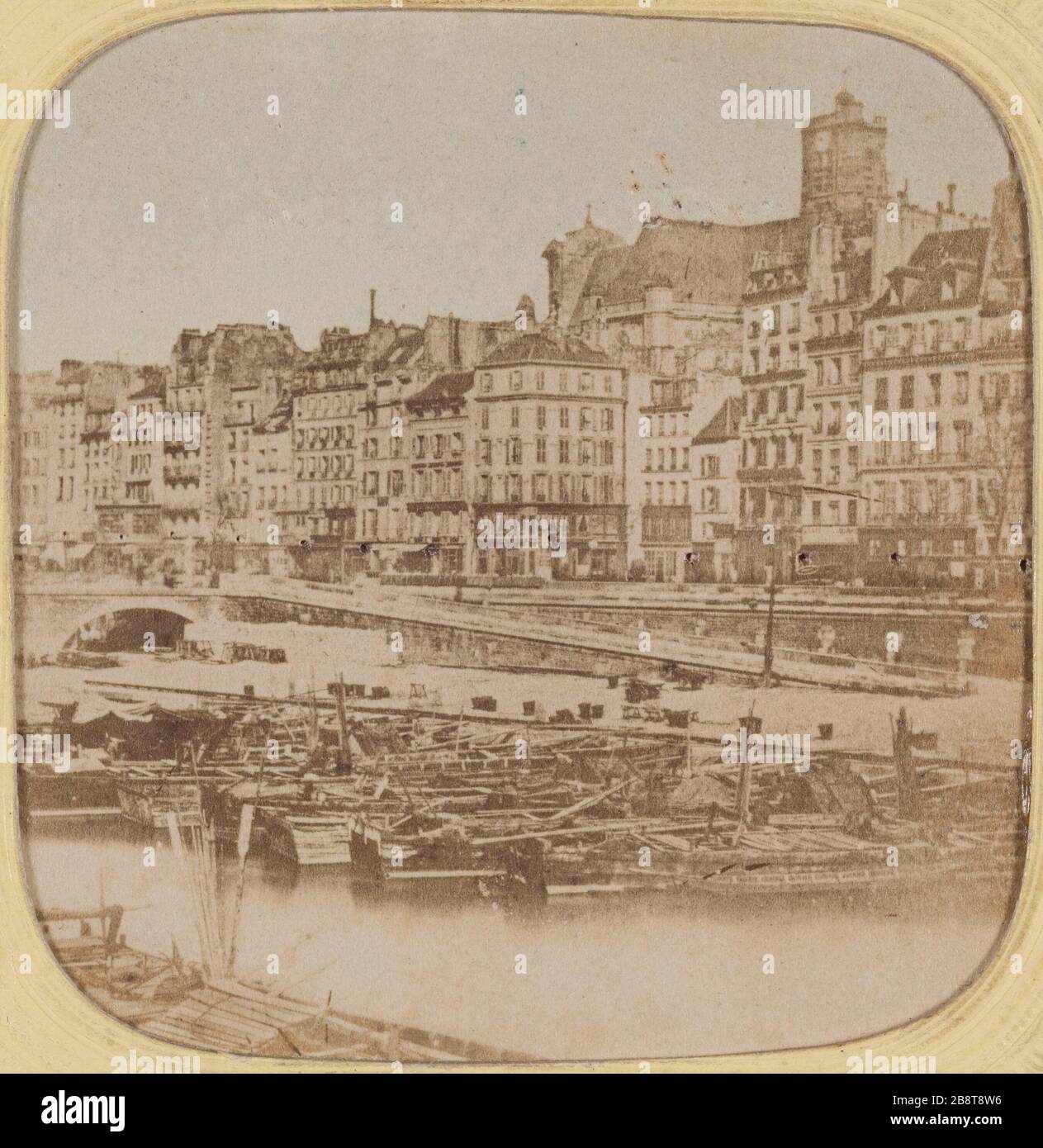 Indossando l'Hotel de Ville visto dal Quai de Bourbon. La posta. Vista a destra le Port de l'Hôtel-de-Ville vu du quai de Bourbon. 'Le Mail'. Vue droite. Vue stéréoscopique trasparente coloriée (effet nocturne), papier albuminé, trus de lumière avec bandes de papier couleur collées au verso. Parigi (IVème arr.). 1855-1865. Anonima fotographie. Parigi, musée Carnavalet. Foto Stock