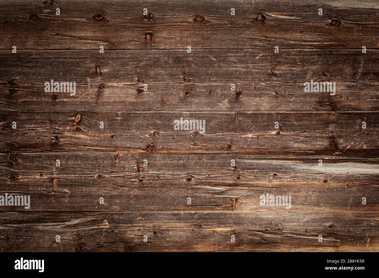 Scuro dello sfondo in legno Foto Stock
