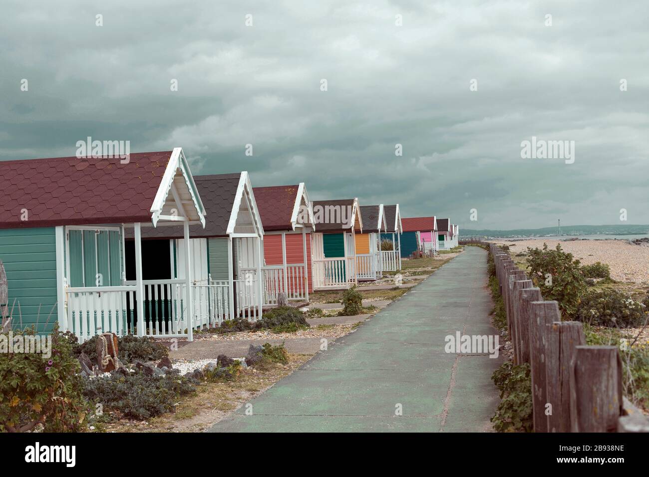 Colorata spiaggia Huts by the Sea Foto Stock