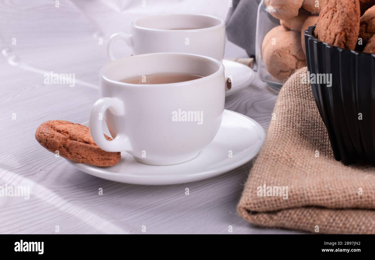 Tazza di tè con biscotti Foto Stock