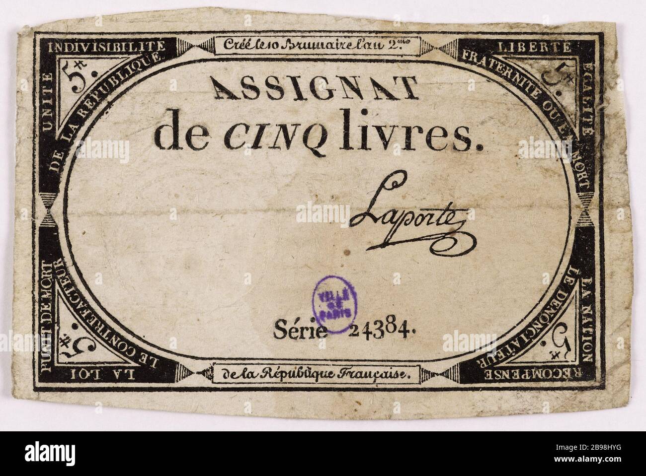 Assignat 5 libbre, serie 24 384, 10 Brumaire anno 2. Nicolas Marie Gatteaux (1751-1832). Assignat de 5 livres, série 24384, 10 brumaire an 2. Typographie, encré. Parigi, musée Carnavalet. Foto Stock