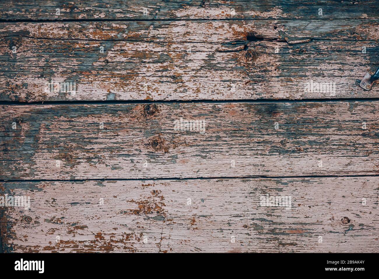 vecchio sfondo di legno sporco con vernice rosa Foto Stock